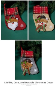 Detail of linen Christmas stockings with Santa, snowman and reindeer plush patterns