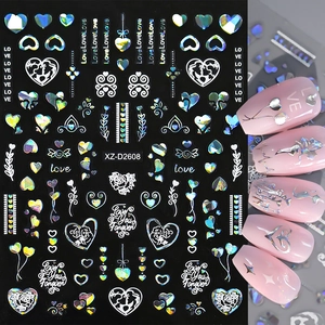 Detailed laser Valentine heart nail stickers with rose patterns applied on pink nails