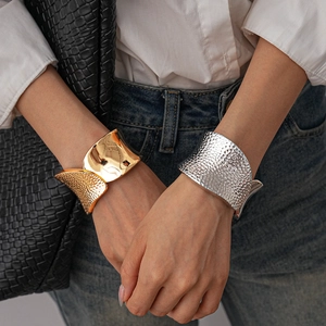 Irregular textured wide open metal cuff bracelet in gold and silver finish for women