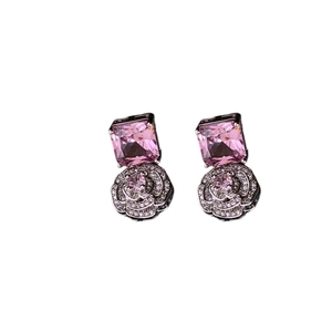 Pink square zircon earrings with silver 3D rose flower design on white background