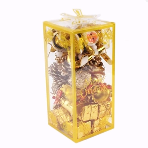 Golden Christmas tree ornament set with Santa and pinecones in transparent gift box