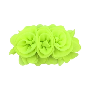 Detailed view of neon yellow chiffon rose hair flower showing fabric texture and layers