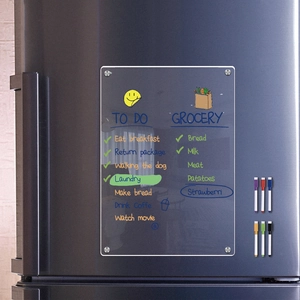 Detailed view of clear acrylic magnetic planner board on fridge with 6 markers