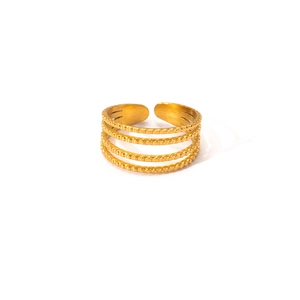 Close-up of a four-layer gold beaded titanium steel ring with an adjustable open design