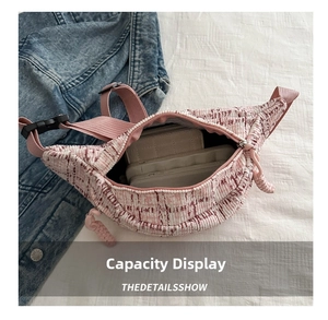 Capacity display of tweed crossbody bag showing interior space for wallet and phone