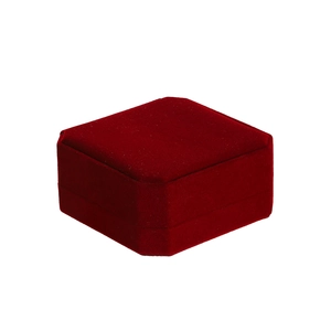Detailed view of an octagonal dark red velvet jewelry box for rings and small accessories