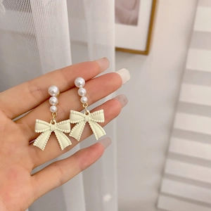 Long bowknot pearl earrings with elegant white beads and aesthetic drop pendants