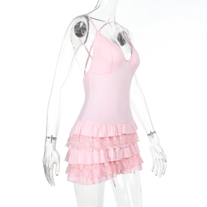 Detailed side view of pink lace multi-layered ruffled bodysuit on a mannequin