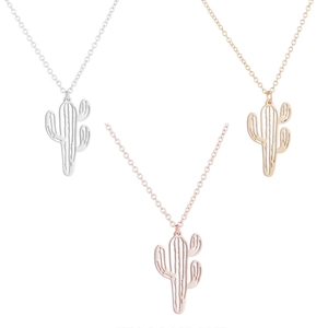 Detailed view of hollow cactus pendant necklaces in silver, gold, and rose gold finishes