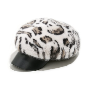 Detail of leopard print baker boy hat with faux fur texture and black PU leather brim