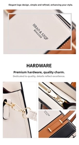 Detail view of gold-tone hardware and brand logo on a color-block leather handbag