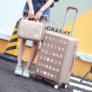 Pink ballet stickers on champagne gold hard shell suitcase set with vanity case
