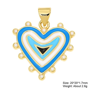 Macro detail of heart-shaped evil eye pendant in gold finish with 20x20mm size info
