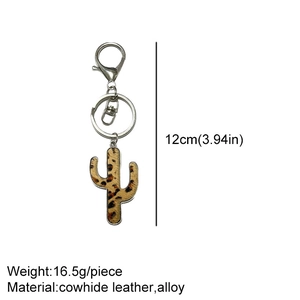 Detail view of leopard print cowhide leather cactus keychain with dimension 12cm marking