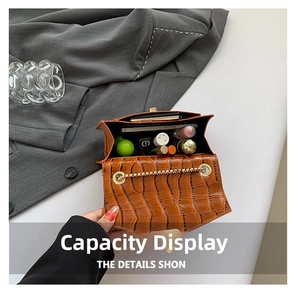Top view showing interior capacity of the crocodile embossed leather chain bag
