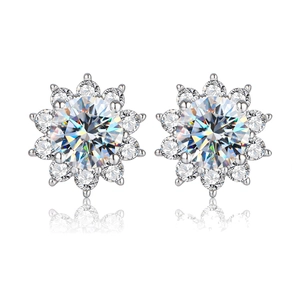 Macro shot of 925 sterling silver moissanite stud earrings with a sunflower halo design