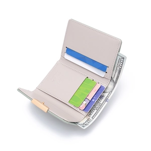 Open trifold wallet in light green PU leather featuring card slots and bill compartment