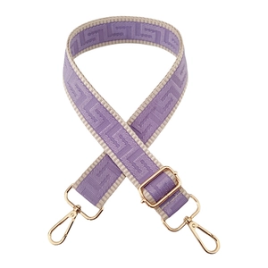 Close-up of 3.8cm purple maze pattern bag strap with golden metal lobster clasps