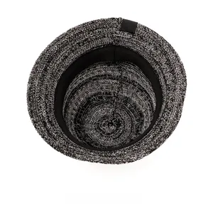 Detail view of the breathable knitted bucket hat interior with sweatband and adjustable ribbon