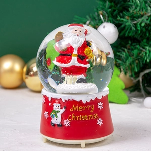 Close-up of Santa Claus snow globe with red resin base featuring snowman relief
