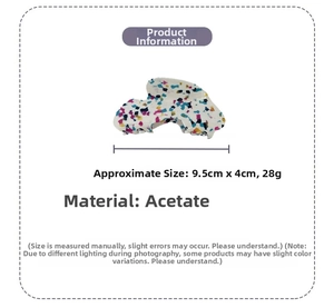 Detail view of floral acetate hair claw clip showing dimensions 9.5cm length and 28g weight