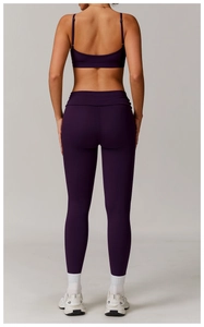 Back view of high-elasticity dark purple yoga set with racerback bra and leggings