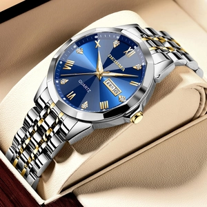 Luxury men's gold and silver steel watch with a deep blue dial and luminous hands