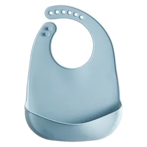 Adjustable light blue food-grade silicone baby bib with a 3D pocket for meals