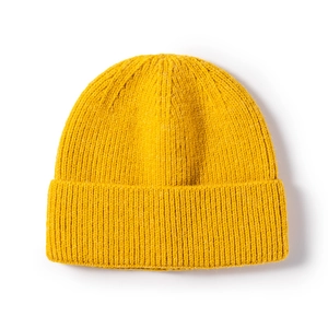 Winter mustard yellow ribbed knit beanie with fold-over cuff for outdoor warmth