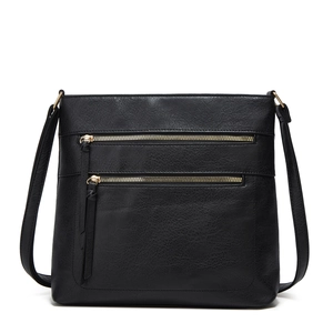 Minimalist black vintage leather tote bag with dual gold zippers and adjustable shoulder strap