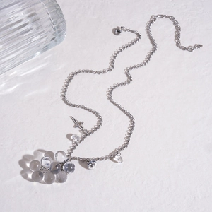 Minimalist silver chain necklace with clear grape cluster pendant and star charms