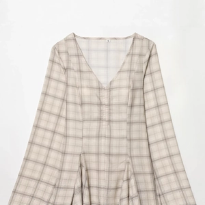 Fashionable V-neck plaid mini dress with flare sleeves in beige and brown check pattern