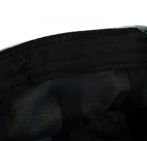 Detail of newsboy hat inner lining made of 80% cotton and 20% polyester fabric