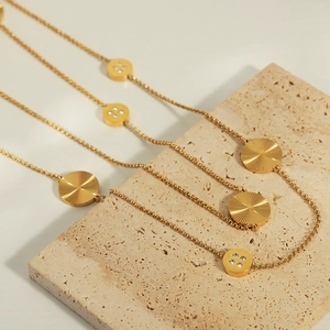 Elegant multi-layer titanium steel necklace with diamond-set round textured pendants