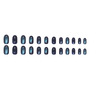 Elegant deep blue cat eye press-on nails with oval shape and shimmering magnetic effect