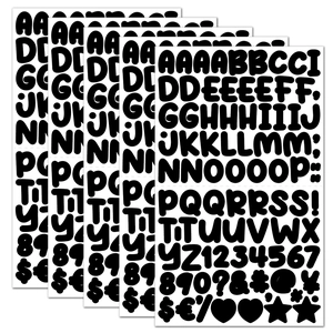 Detailed stacked view of black 0.5-inch cartoon alphabet and numeric sticker sheets