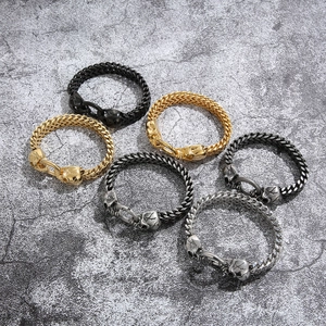 Punk skull head stainless steel bracelets in black, gold, and silver finishes for men