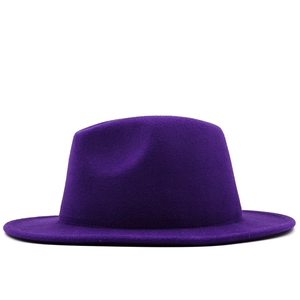 Detail view of the vibrant purple wool felt fedora with a wide flat brim and structured crown