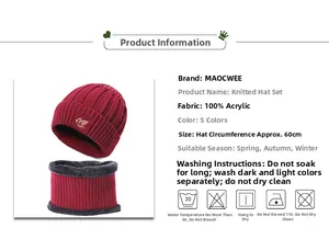 Detail view of burgundy knitted hat and scarf set with thick grey fleece lining