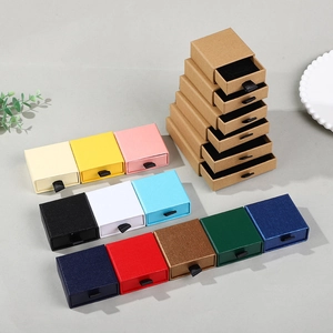 Multi-colored drawer jewelry boxes in various sizes with satin ribbon pulls