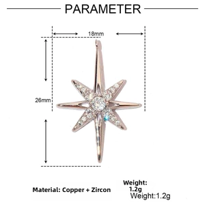 Detalle del colgante de estrella en oro de 18k con circonitas, mide 18mm por 26mm