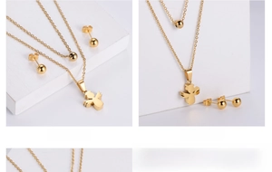 Vue détaillée du collier doré multicouche avec pendentif ange minimaliste et perle ronde