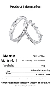 Detail view of S925 sterling silver couple rings with wave shape and cubic zirconia inlay