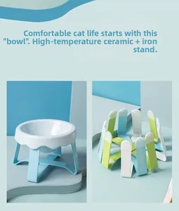 Detail of a wavy-edged ceramic cat bowl with a sturdy metal iron stand for neck protection