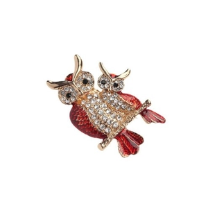 Charming red owl brooch with crystals and gold finish on a delicate branch base