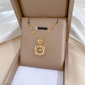Elegant gold double heart necklace with crystal diamonds in a premium brown jewelry box