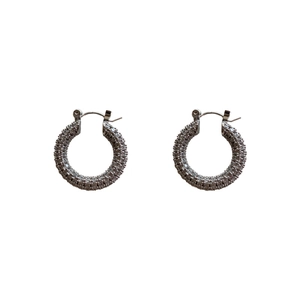 Elegant silver U-shaped hoop earrings with shimmering pavé cubic zirconia crystals