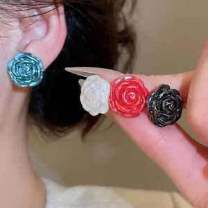 Elegant floral pearl earrings set in blue, white, red, and black resin for women