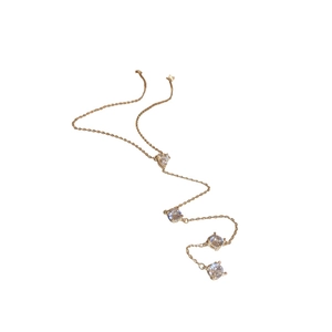 Collier en Y doré élégant avec quatre pierres rondes en zircone cubique étincelantes