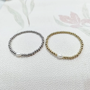 Waterproof stainless steel bead bracelet with freshwater pearl in gold and silver finish